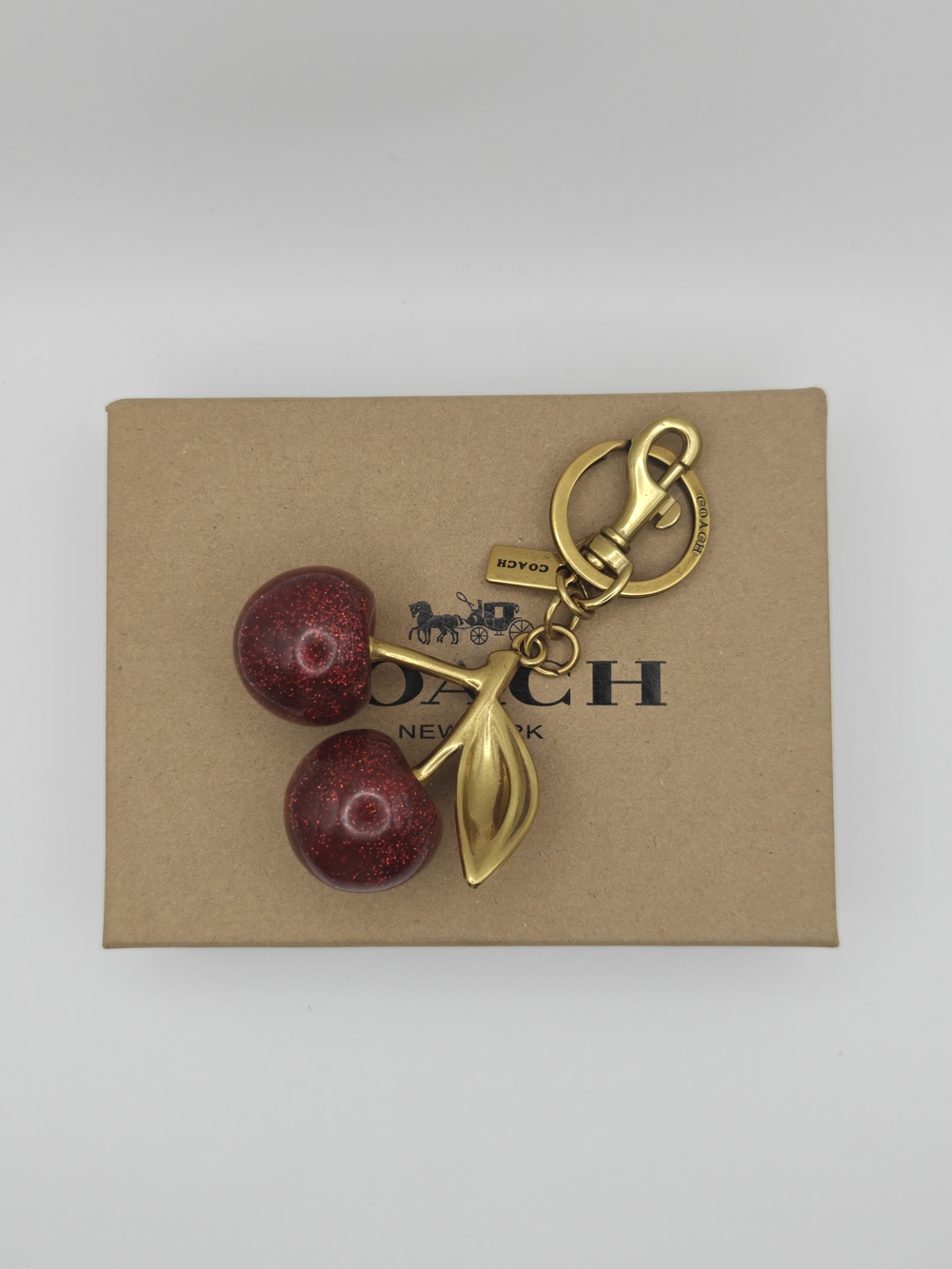 Coach Gold-Tone Cherry Key Charm with Red Glitter Cherries